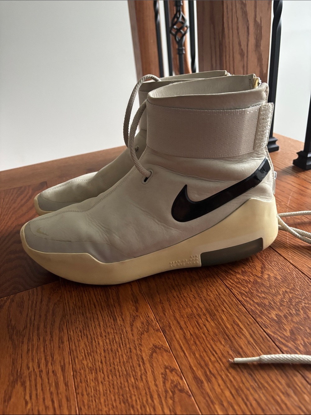 Nike Men’s High-Top Cream Leather Sneakers with Black Swoosh